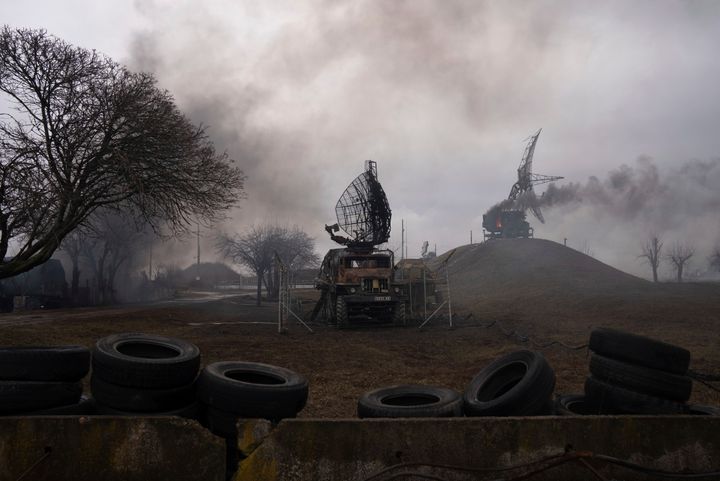 Smoke rise from an air defense base in the aftermath of an apparent Russian strike in Mariupol, Ukraine, on Feb. 24, 2022. (AP Photo/Evgeniy Maloletka, File)